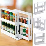 Compact two-tier adjustable spice rack organizer with sliding drawers, made of durable white plastic, neatly arranged in a kitchen cabinet